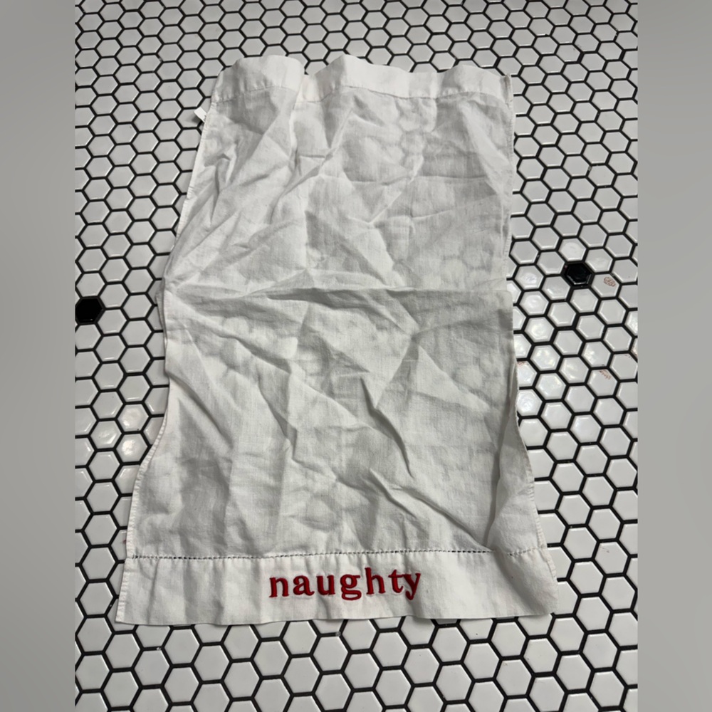 Holiday White Kitchen Towel with Red Embroidery saying naughty
